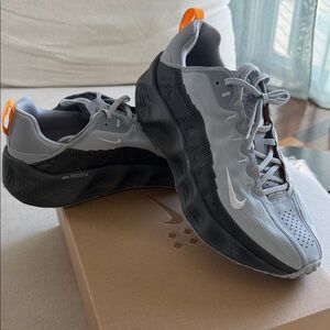 Gray and Black Athletic Sneakers with Orange Accents - Nike Ava Rovers